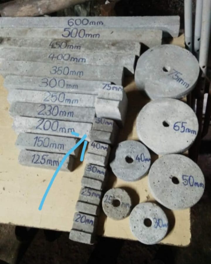RCC cover blocks used for spacing reinforcement in concrete structures | Rectangular concrete cover block used in RCC construction | Construction-grade concrete cover block for reinforcement